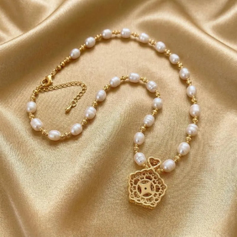 Pearl Flora Star Spinner Kinetic Necklace
