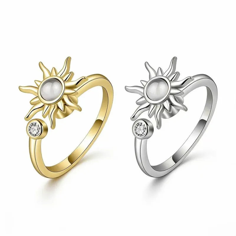 Rotating sun cat-eye stone open rings in gold and silver, minimalist luxury style.