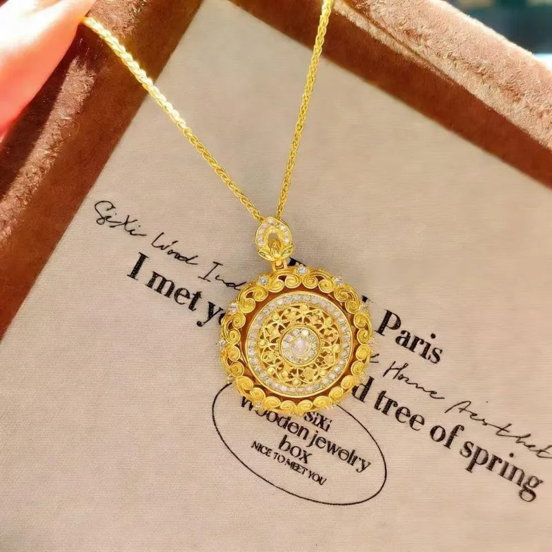 Rotating Eight Treasures Compass & Filigree Lace Border Necklace