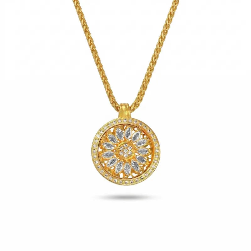 Rotating gold sunflower medallion pendant featuring diamond-encrusted petals and halo, suspended on a Chopin chain.