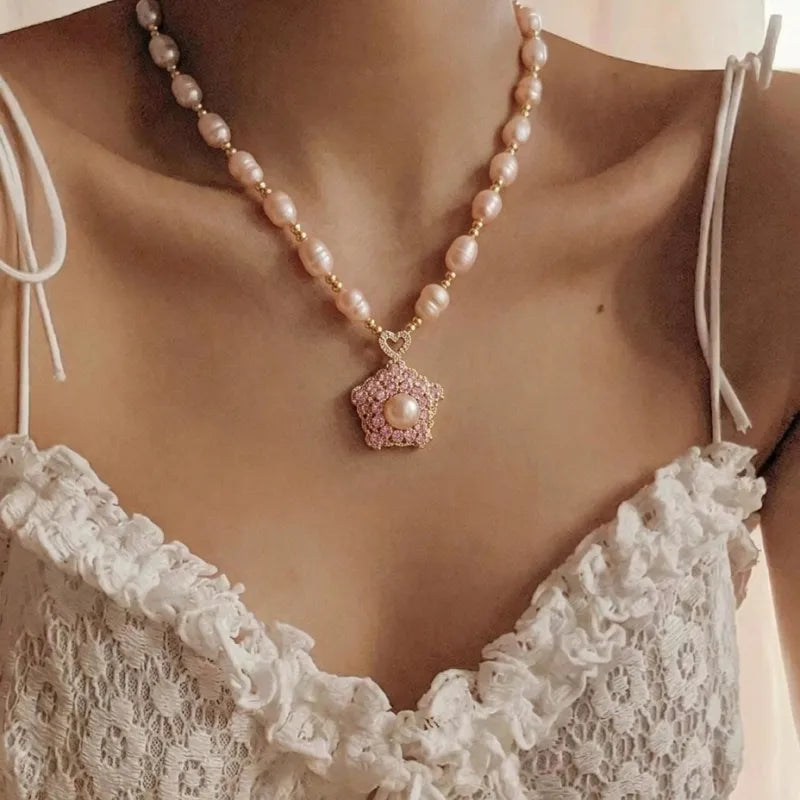 Pearl Flora Star Spinner Kinetic Necklace