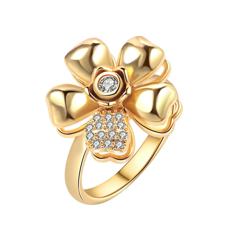 Mercury kinetic sunflower ring in 24K gold-plated stainless steel. Features a spinning 3D flower head with AAA Zirconia accents for smooth, silent anxiety relief.