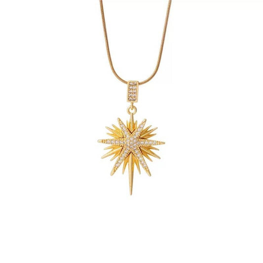 Mercury brand tarnish-resistant gold starburst pendant necklace made of 18k gold plated stainless steel, minimalist waterproof celestial jewelry.