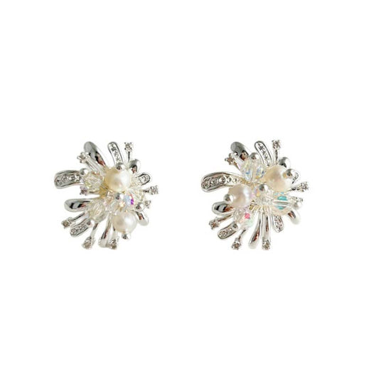 Pair of Mercury brand silver starburst stud earrings with three central pearls surrounded by sparkling clear crystals.