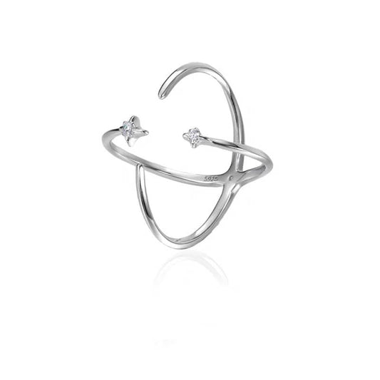 Mercury reversible sterling silver cross ring featuring a sparkling CZ star and moon design.